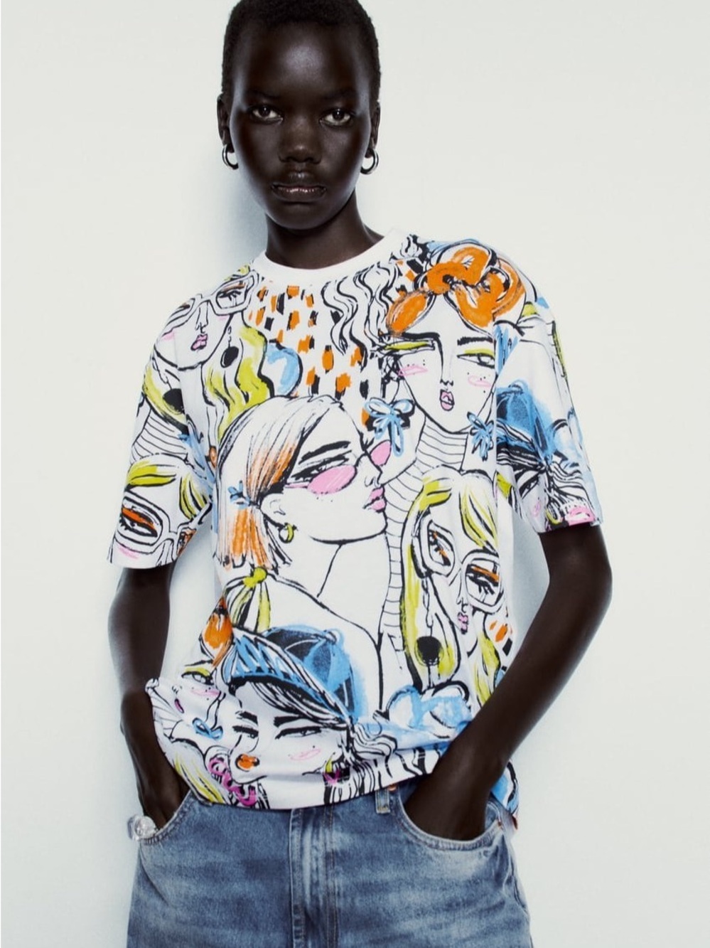Zara White Tee with Black Line Art and Orange Accents
